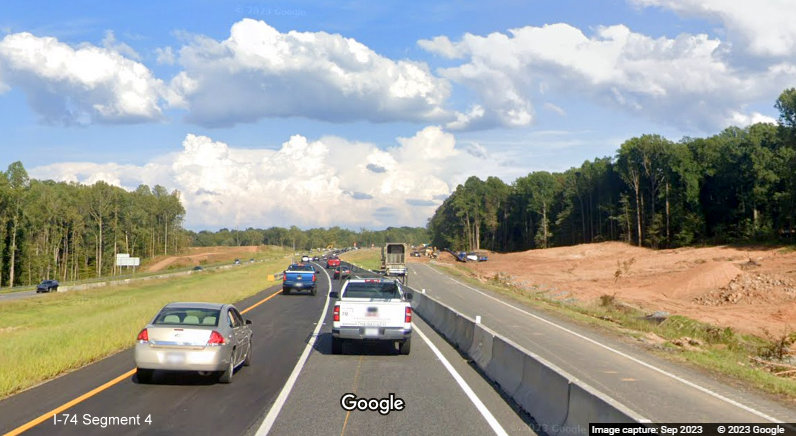 View of traffic transitioning to newly opened temporary I-74 East lanes through future Winston-Salem Northern Beltway 
       interchange construction area, Google Maps Street View, September 2023