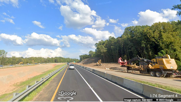 View of traffic in temporary I-74 East lanes through future Winston-Salem Northern Beltway 
       interchange construction, Google Maps Street View, September 2023