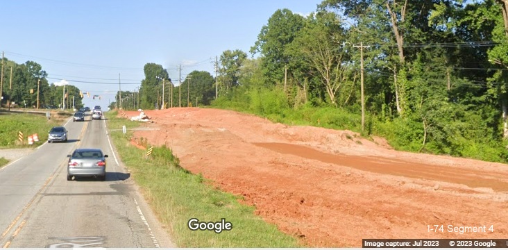 Image looking at temporary road construction from Kernersville Road in I-74/Winston-Salem Northern Beltway 
       interchange construction site, Google Maps Street View image, July 2023