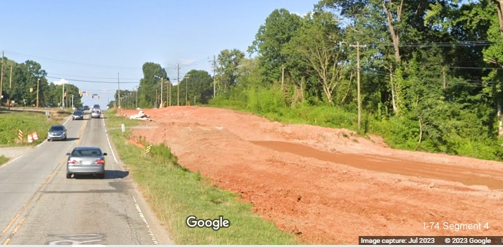 Image looking at temporary road construction from Kernersville Road in I-74/Winston-Salem Northern Beltway 
       interchange construction site, Google Maps Street View image, July 2023