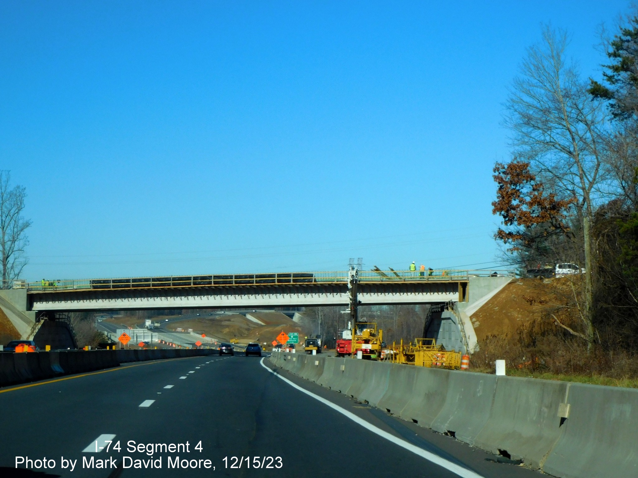 Image of US 52 North approaching the future off-ramp to NC 74 East/Winston-Salem Northern
      Beltway prior to the Ziglar Road bridge, by Mark David Moore, December 2023