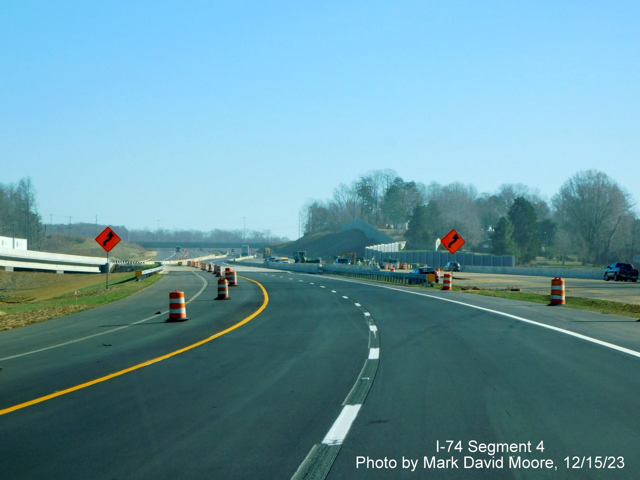Image of of NC 74 (Future I-74) East using westbound lanes approaching Grassy Creek bridges near  
        NC 66 exit, by Mark David Moore, December 2023