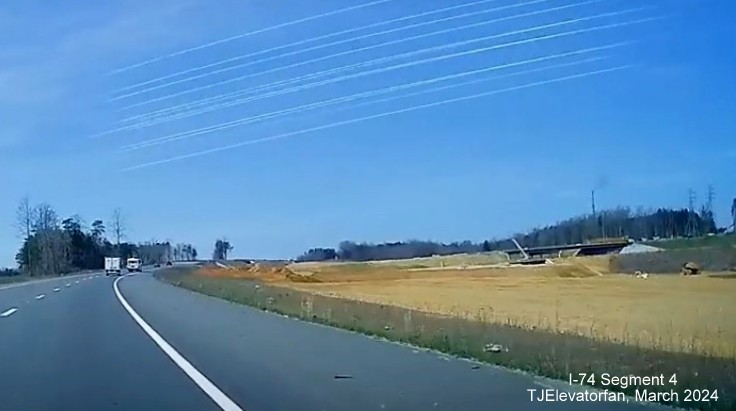Image from US 52 (Future I-285) North of NC 74 (Future I-74)/Winston-Salem Northern 
       Beltway interchange construction zone, screen grab from TJElevatorfan video, March 2024