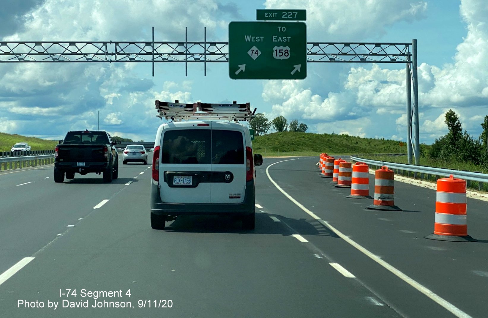 Image of uncovered overhead exit sign for newly opened NC 74 West Winston Salem Northern Beltway on US 421 North, by David Johnson September 2020