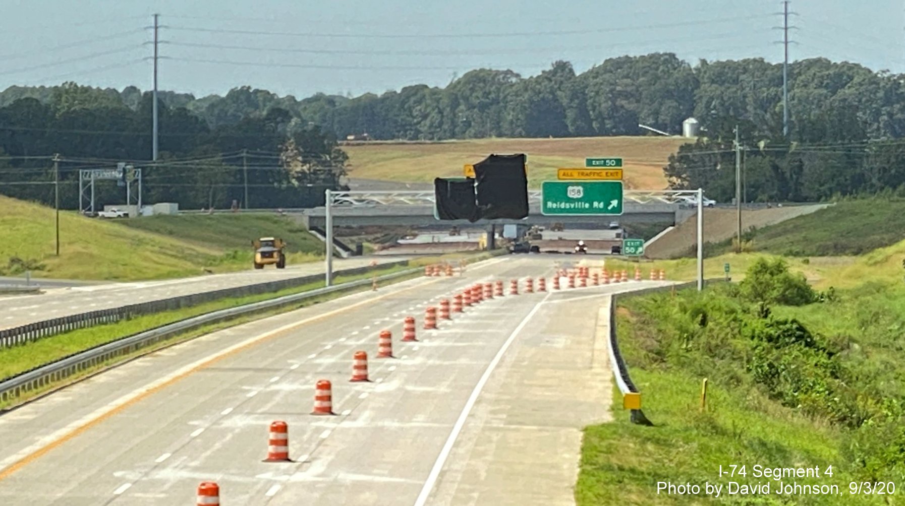 Image of closeup of signage at current western end of NC 74 Winston Salem Northern Beltway at US 158 from Walkertown Guthrie Road bridge, by David Johnson September 2020