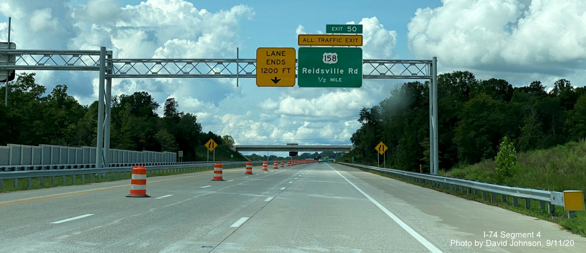 Image of 1/2 Mile advance overhead sign for US 158 exit on NC 74 (Future I-74) West Winston Salem Northern Beltway, by David Johnson September 2020