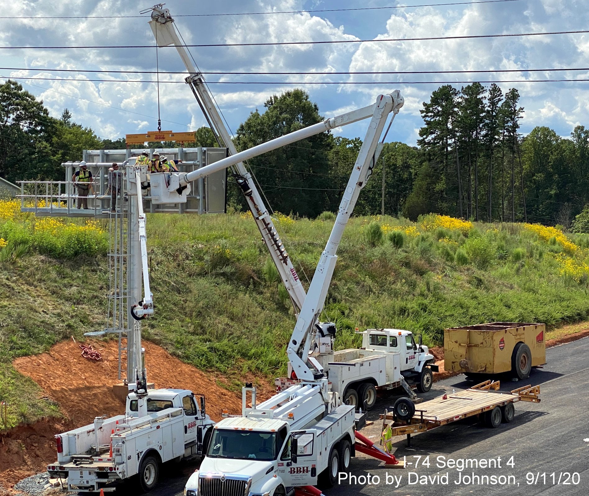 Image of VMS sign being constructed along Future I-74 Winston Salem Northern Beltway
        looking east from Williston Road bridge, by David Johnson September 2020