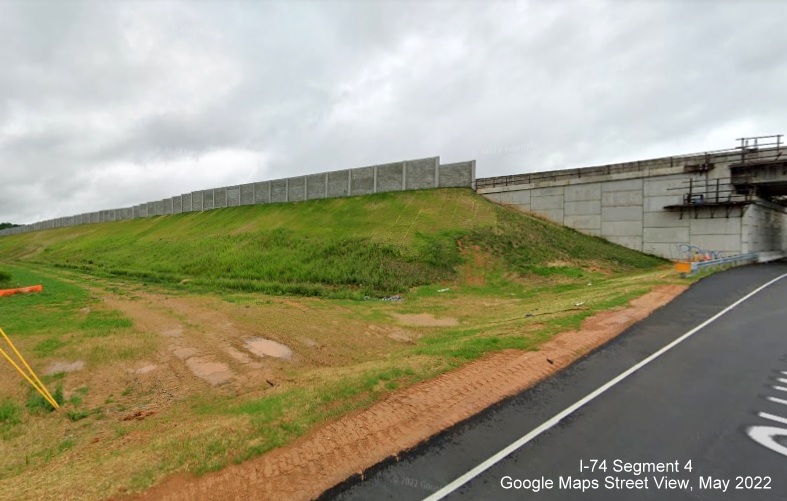 Image of Old Walkertown Road bridge for future I-74/Winston-Salem Northern Beltway, now with 
        noise walls on either side, Google Maps Street View, May 2022