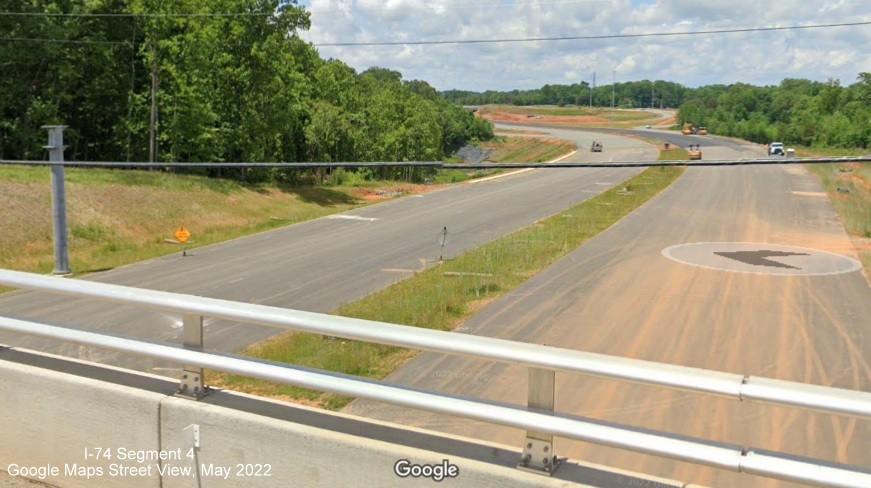 Image looking west from Stanleyville Drive toward future I-74/Winston Salem Northern Beltway 
                                            interchange with NC 66/University Parkway, Google Maps Street View, May 2022