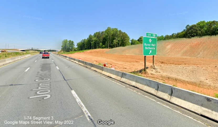 Image of existing NC 65 exit sign in graded area after future Beltway interchange, 
	  Google Maps Street View, May 2022