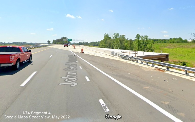 Image entering new US 52 South (Future I-74 East) lanes from NC 65 on-ramp before bridge, Google Maps 
        Street View image, May 2022