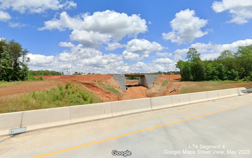 Image of future US 52 North (Future I-285 North) bridge under construction from US 52 South lanes, Google Maps 
        Street View image, May 2022