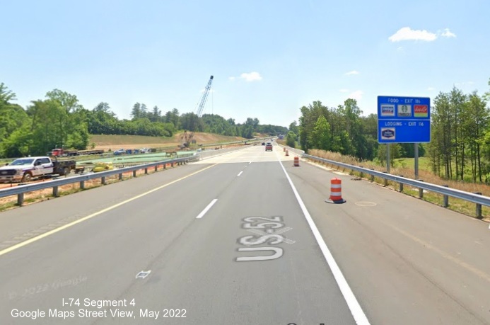 Image of blue services sign along US 52 South (Future I-285 South) lanes at new railroad bridge, Google Maps 
        Street View image, May 2022