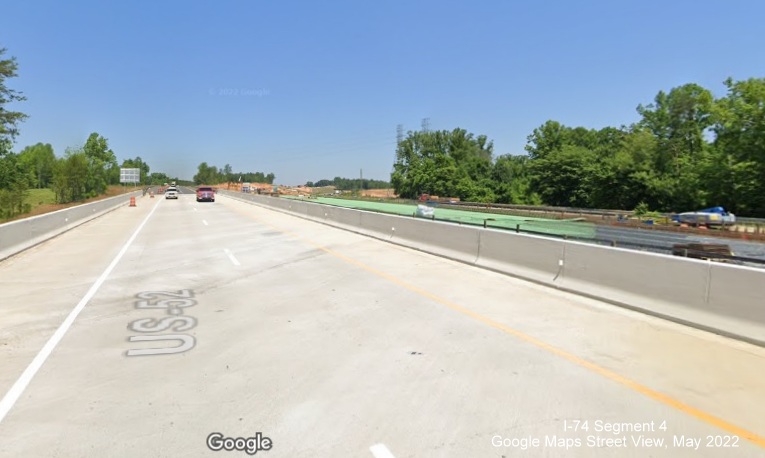 Image of looking back along US 52 South (Future I-285 South) lanes at future US 52 bridge under construction, Google Maps 
        Street View image, May 2022