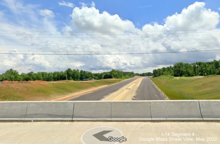 Image of view looking east from NC 8/Germanton Road bridge at future I-74 East/Winston-Salem 
        Northern Beltway, Google Maps Street View, May 2022