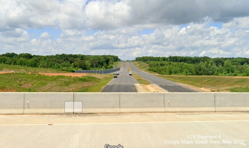 Image of view looking west from NC 8/Germanton Road bridge at future I-74 East/Winston-Salem 
        Northern Beltway, Google Maps Street View, May 2022