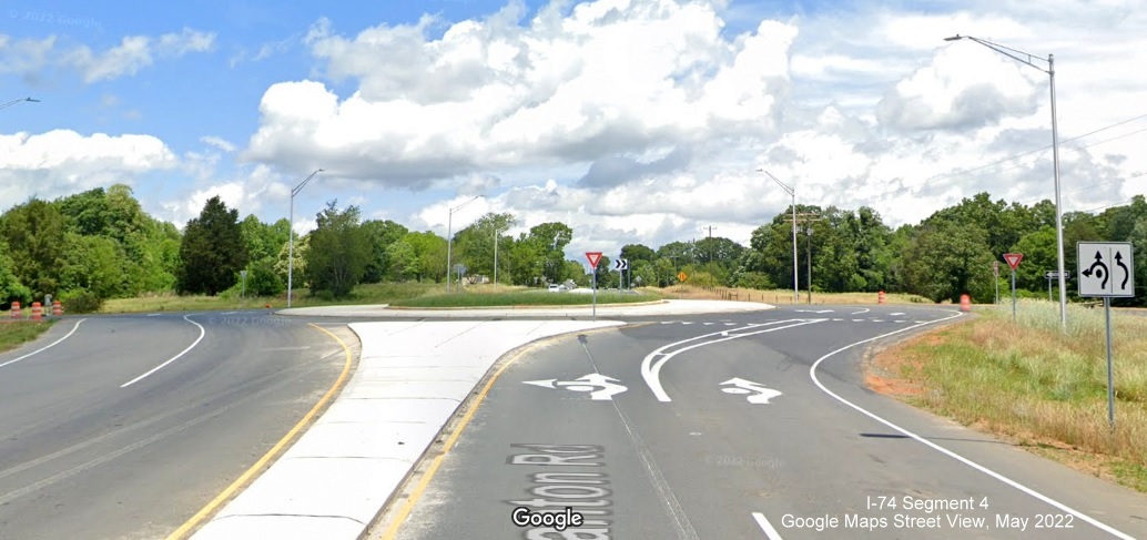 Image of completed northern roundabout on NC 8/Germanton Road bridge at future I-74 East/
        Winston-Salem Northern Beltway ramps, Google Maps Street View, May 2022