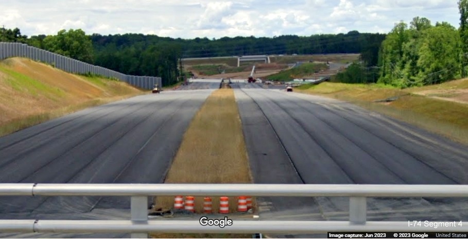 Image from NC 66 bridge looking west toward future I-74 Beltway/US 52 interchange under construction, 
        Google Maps Street View, June 2023