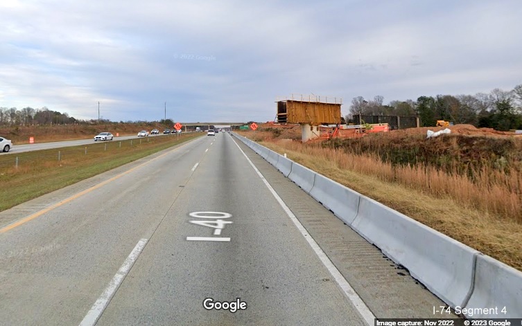 Image of bridge support under construction along I-40 East lanes for future interchange with I-74/Winston-Salem 
       Northern Beltway in Forsyth County, Google Maps Street View, November 2022