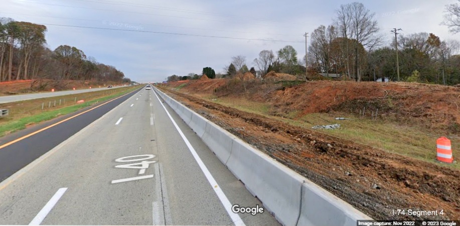 Image of clearing and grading along I-40 East lanes for future interchange with I-74/Winston-Salem 
       Northern Beltway in Forsyth County, Google Maps Street View, November 2022