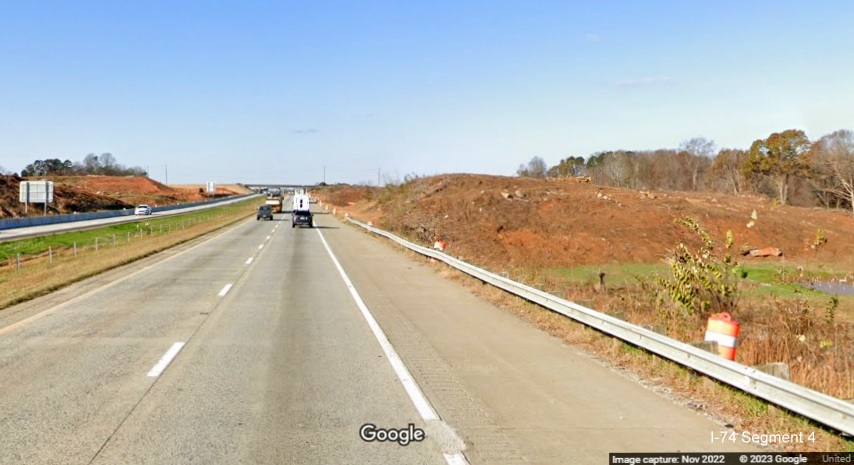 Image of clearing and grading along I-40 West lanes for future interchange with I-74/Winston-Salem 
       Northern Beltway in Forsyth County, Google Maps Street View, November 2022