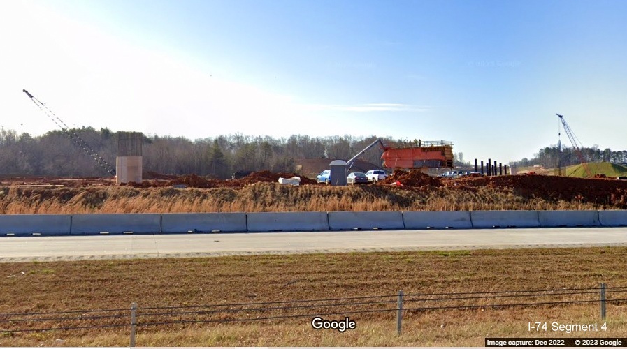 Image of bridge structures being constructed along I-40 East lanes for future interchange with I-74/Winston-Salem 
       Northern Beltway in Forsyth County, Google Maps Street View, December 2022