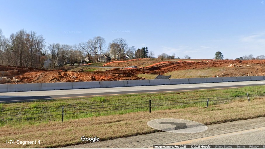 Image of construction equipment and grading along I-40 East at eastern end of I-74/Winston-Salem Northern Beltway 
        construction zone, Google Maps Street View, February 2023