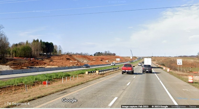 Image of construction equipment and grading at start of I-74/Winston-Salem Northern Beltway 
        construction zone along I-40 East, Google Maps Street View, February 2023