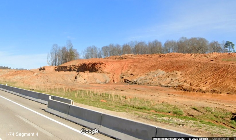 Image of excavation along path of future I-74/Winston-Salem Northern Beltway 
        seen along I-40 East, Google Maps Street View, March 2023