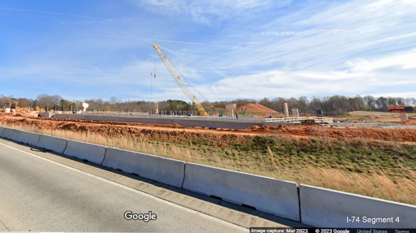Image of construction of bridge that will carry I-40 East lanes over I-74/Winston-Salem Northern 
        Beltway, Google Maps Street View, March 2023