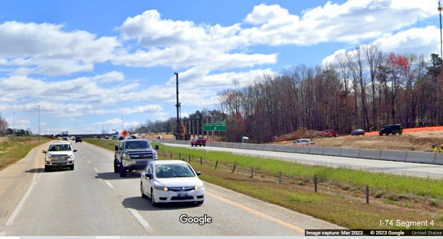 Image of construction of noise wall I-40 East at Union Cross Road, part of I-74 Beltway
        construction project, Google Maps Street View, March 2023