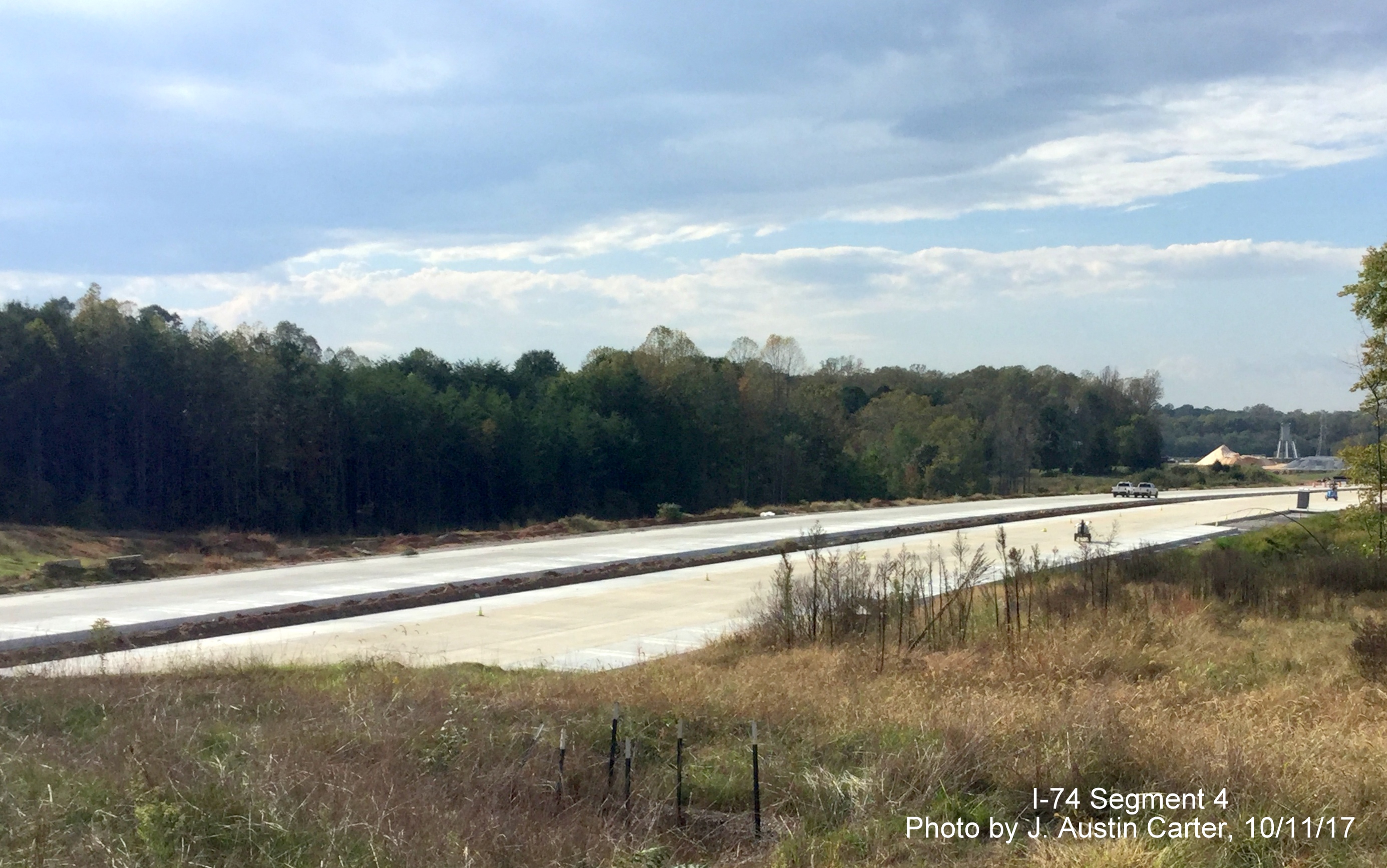 Image of pavement progress along Future I-74/Winston-Salem Norther Beltway from Walkertown Guthrie Rd bridge looking west toward
       US 158, by J. Austin Carter