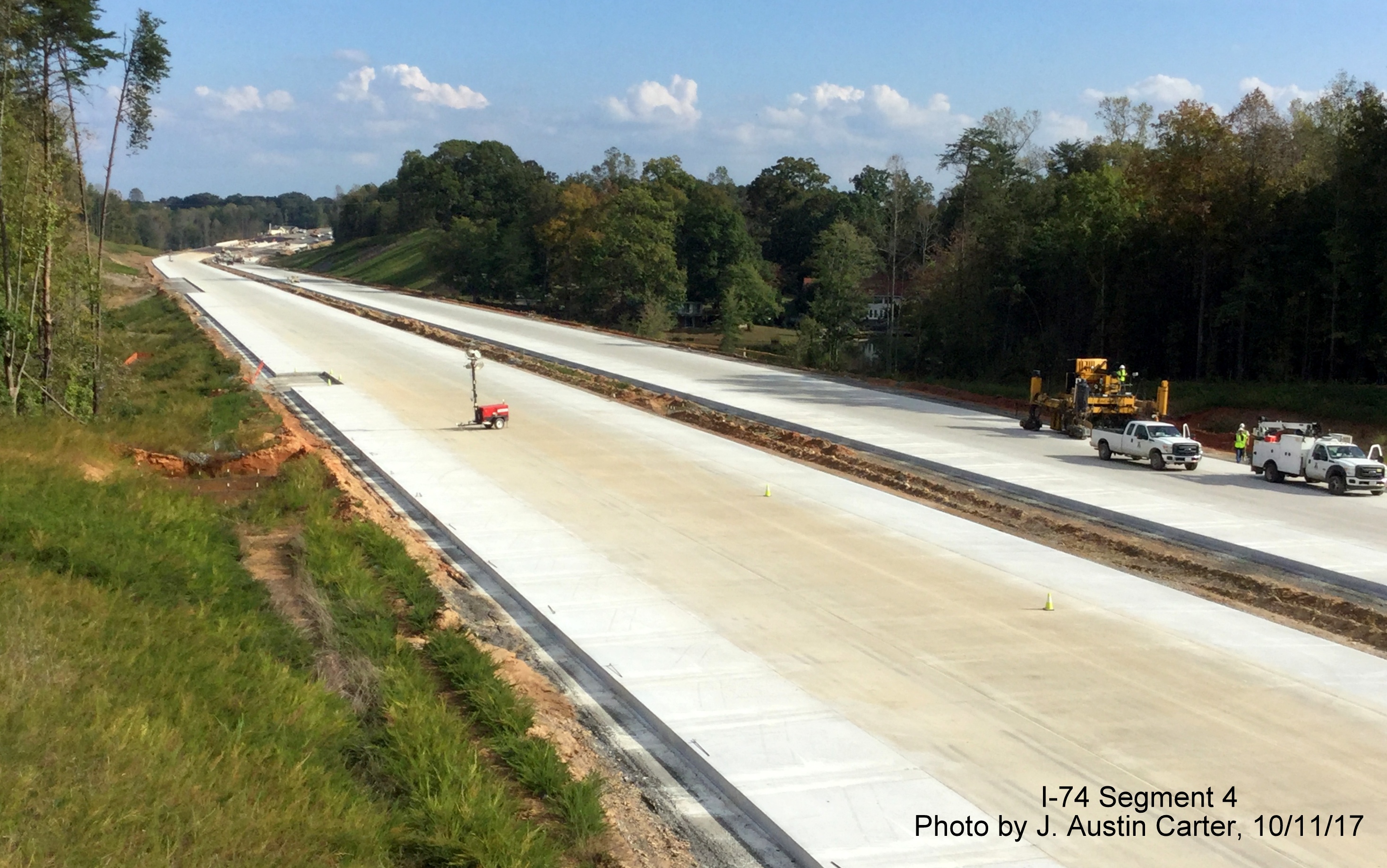 Image of view looking southeast from Walkertown Guthrie Rd bridge along recently concrete line future I-74 roadway, by J. Austin Carter