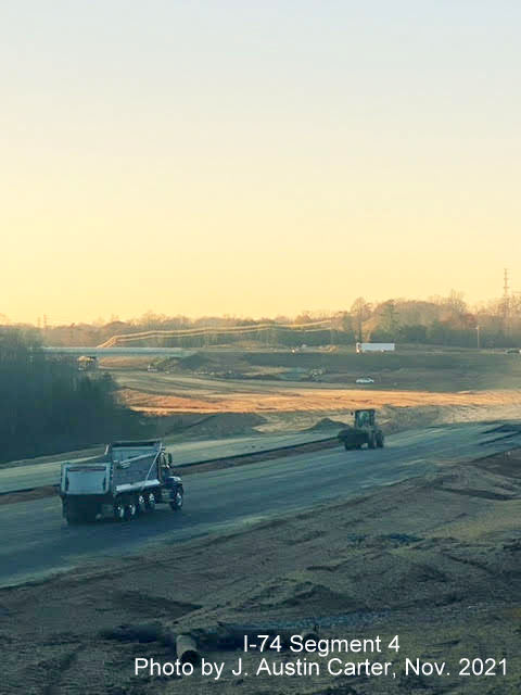 Image of closeup view looking northwest from near Stanleyville Drive showing construction of the I-74/Winston 
        Salem Northern Beltway toward University Avenue, by J. Austin Carter, November 2021