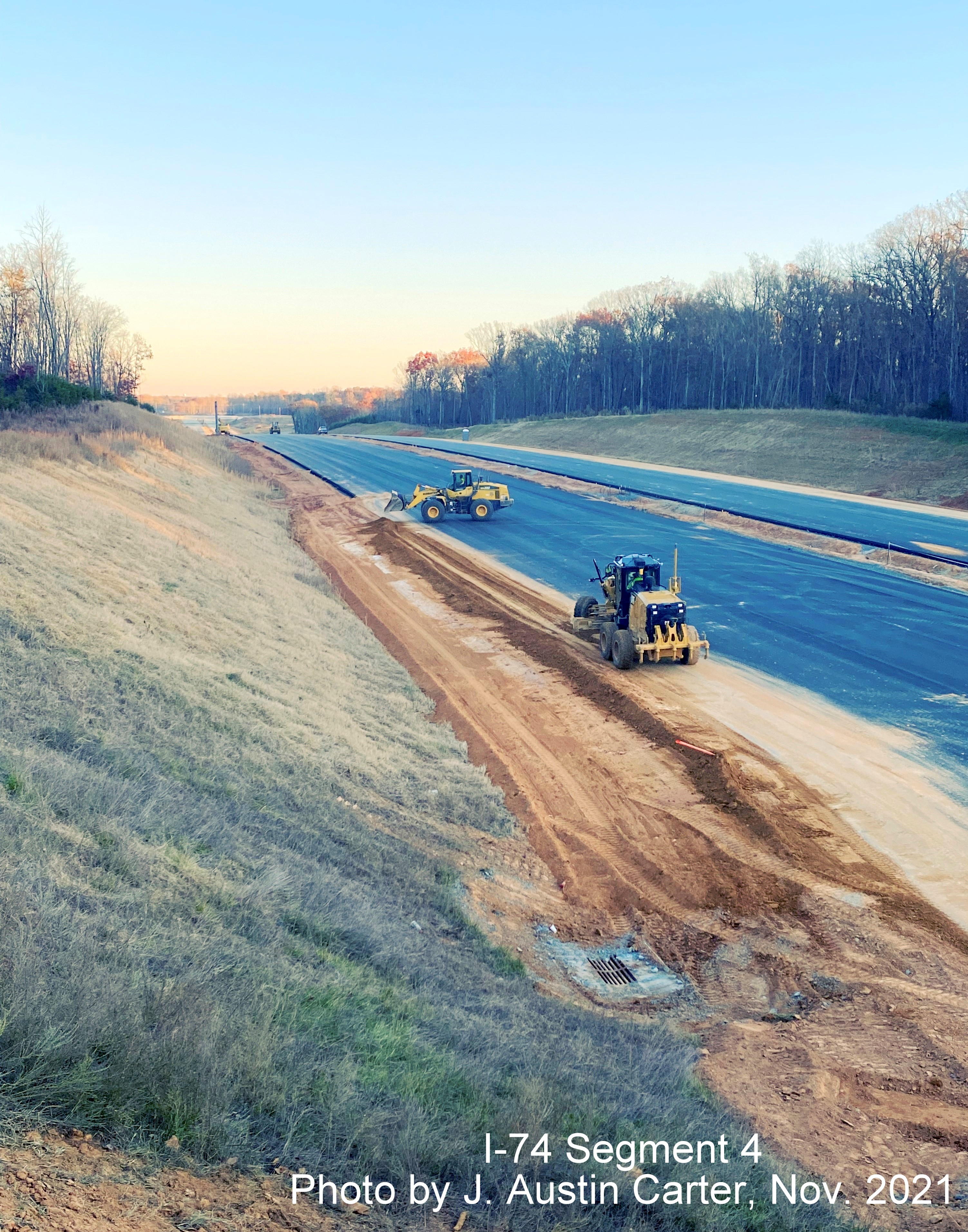 Image of view looking southeast from near Stanleyville Drive showing construction of the I-74/Winston 
        Salem Northern Beltway toward the future NC 8/Germanton Road interchange, by J. Austin Carter, November 2021