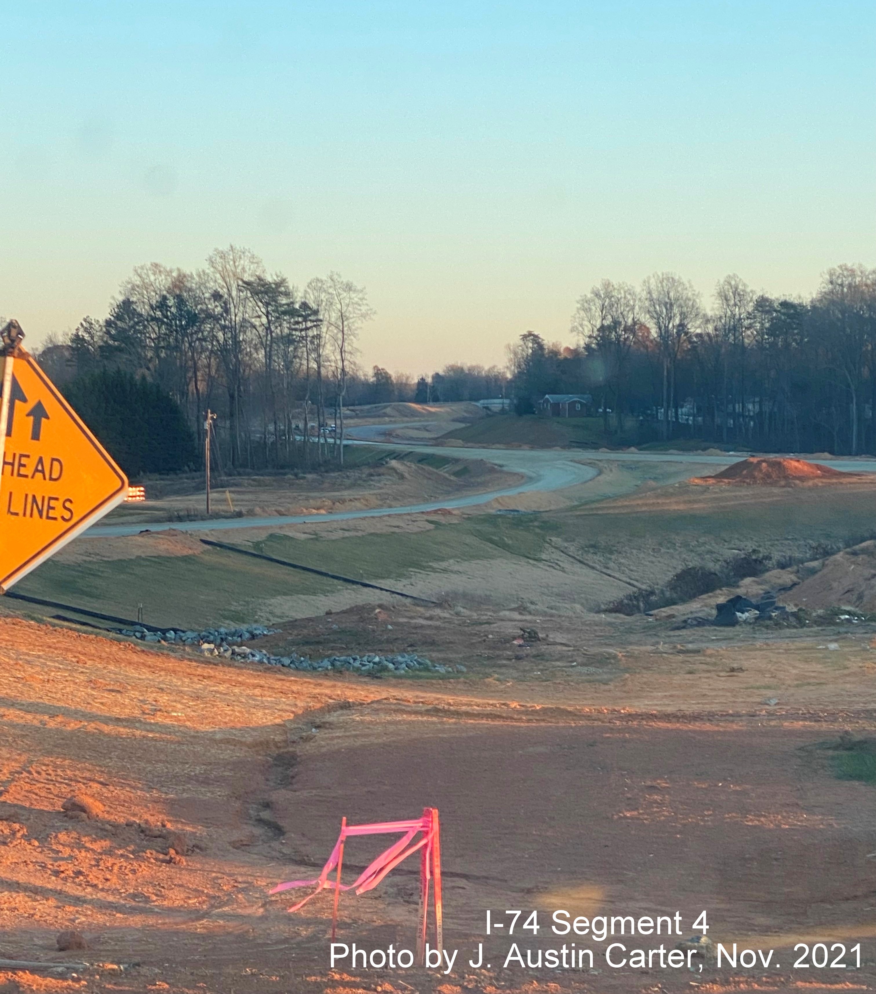 Image of view south/east from NC 8 / Germanton Road near bridge along future I-74 / Winston Salem 
        Northern Beltway toward Old Hollow Road, by J. Austin Carter, November 2021