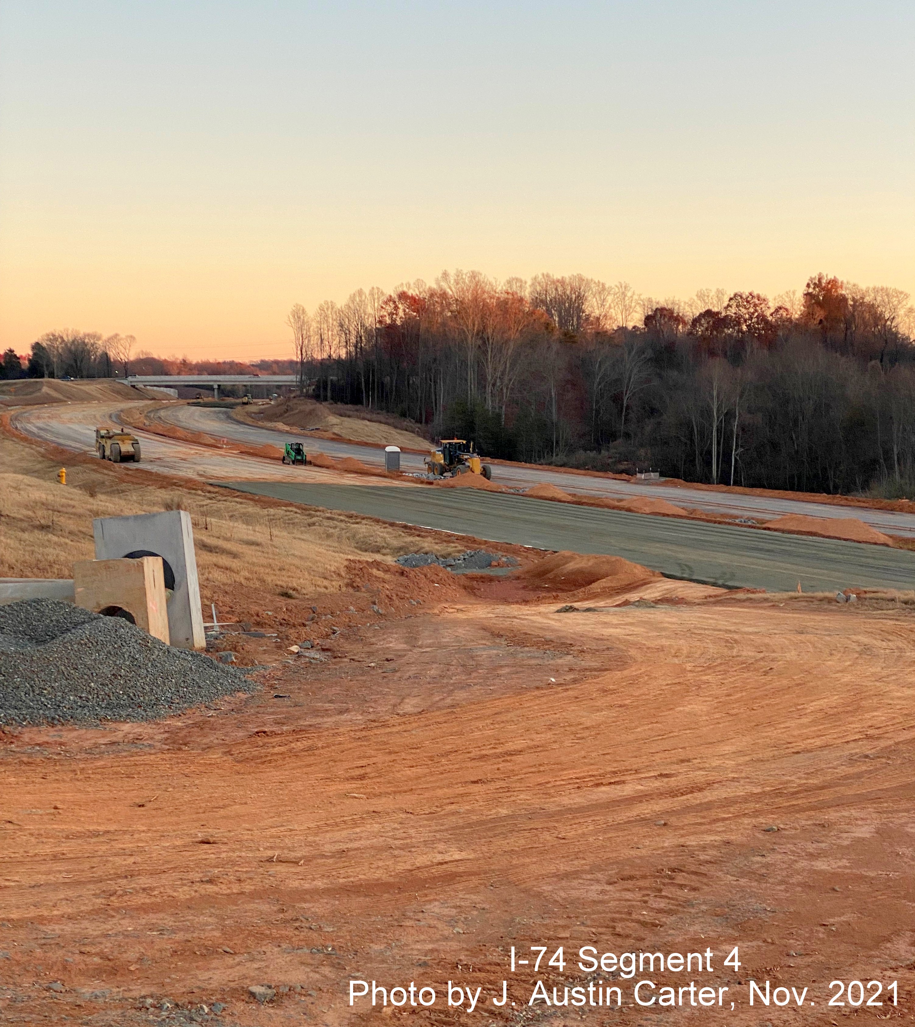 Image of I-74/Winston Salem Northern Beltway construction looking east from Merrydale Drive toward 
           new bridge for Old Hollow Road, by J. Austin Carter, November 2021