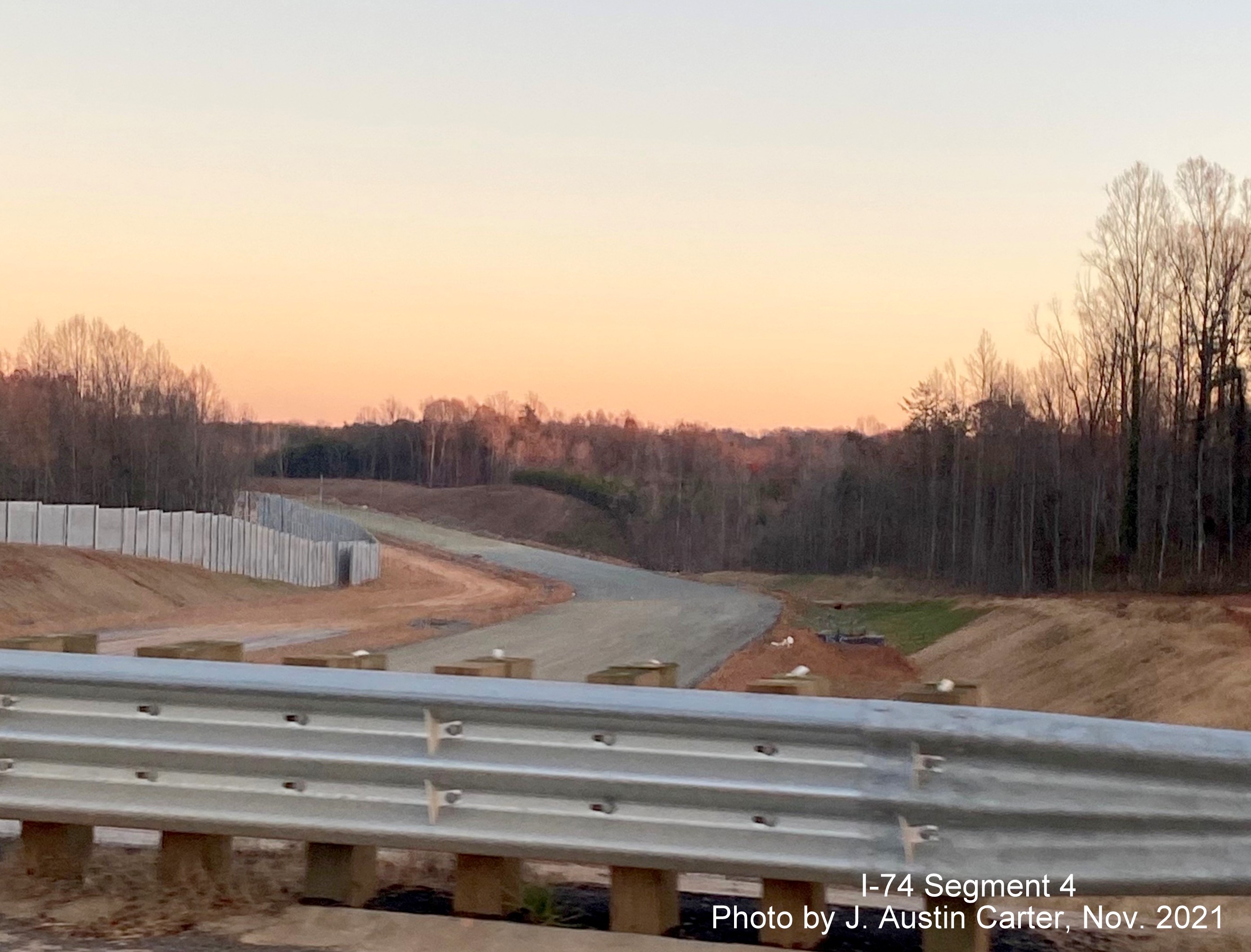 Image of I-74/Winston Salem Northern Beltway from Merry Valley Lane bridge toward 
           new bridge for Old Hollow Road, by J. Austin Carter, November 2021