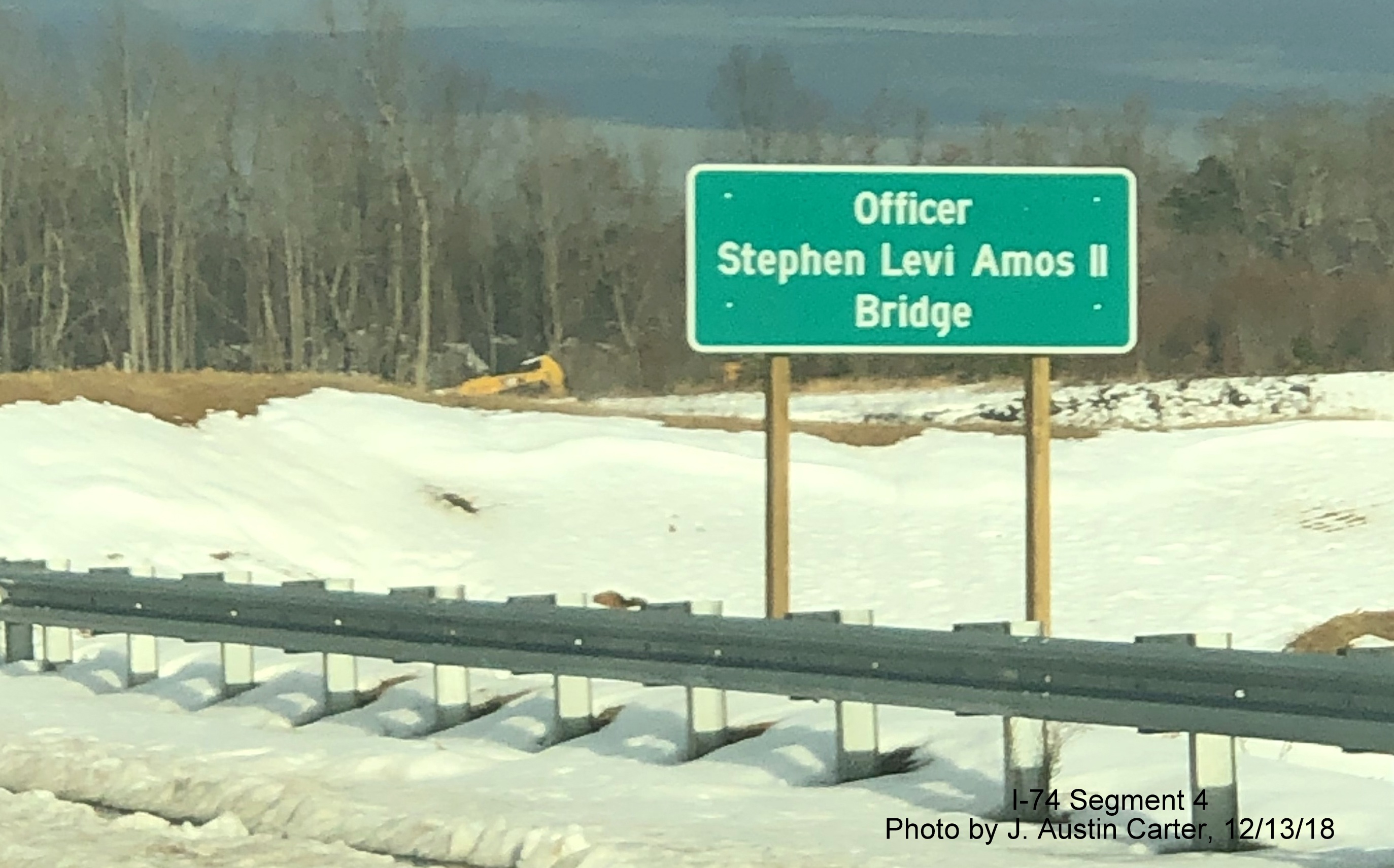 Image of sign dedicating new US 158 bridge to Officer Stephen Levi Amos II over Future I-74/Winston-Salem Northern Beltway, by J. Austin Carter