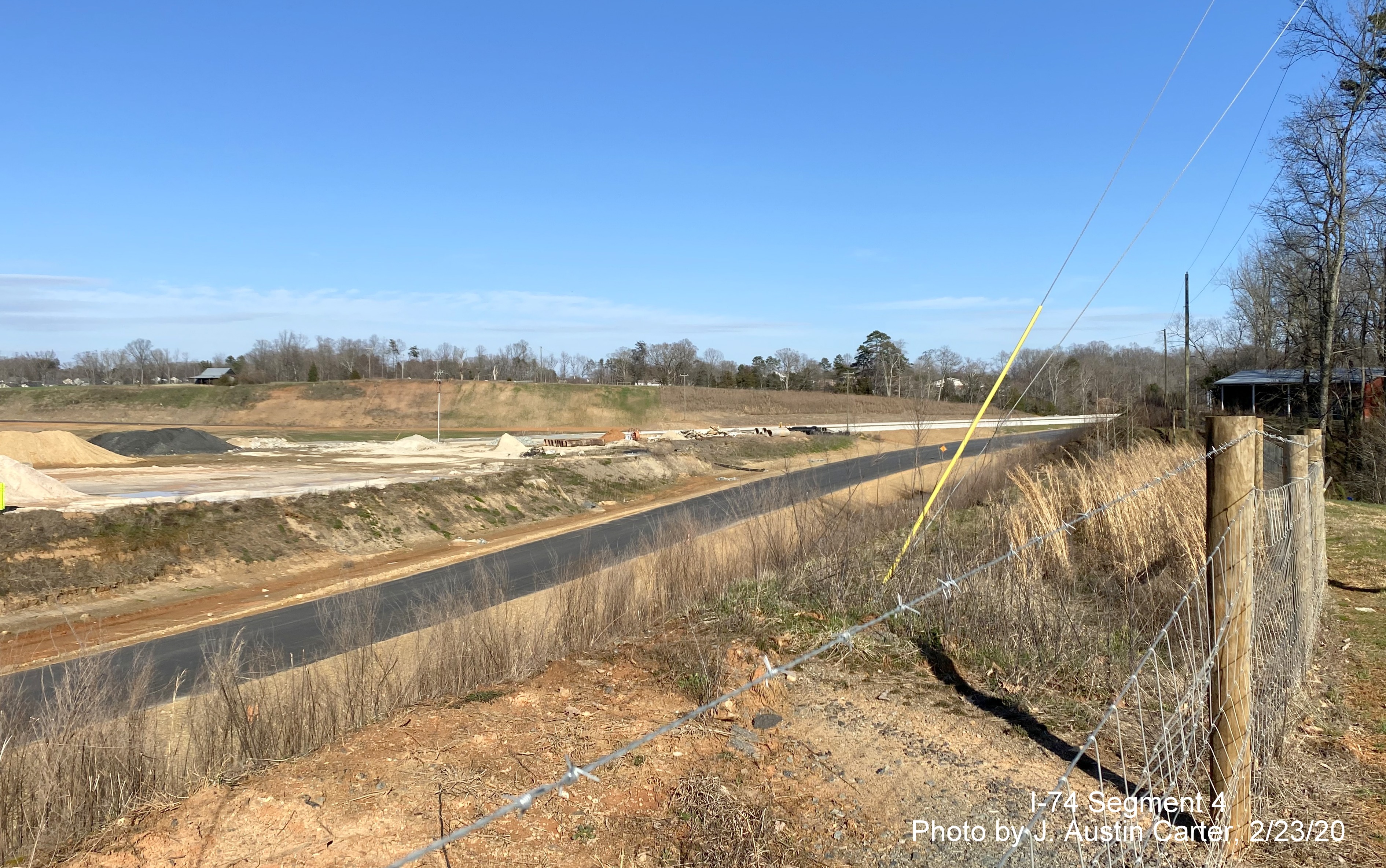Image of newly paved on-ramp from US 158 to Future I-74 East/Winston-Salem Beltway, by 
        J. Austin Carter in Feb. 2020