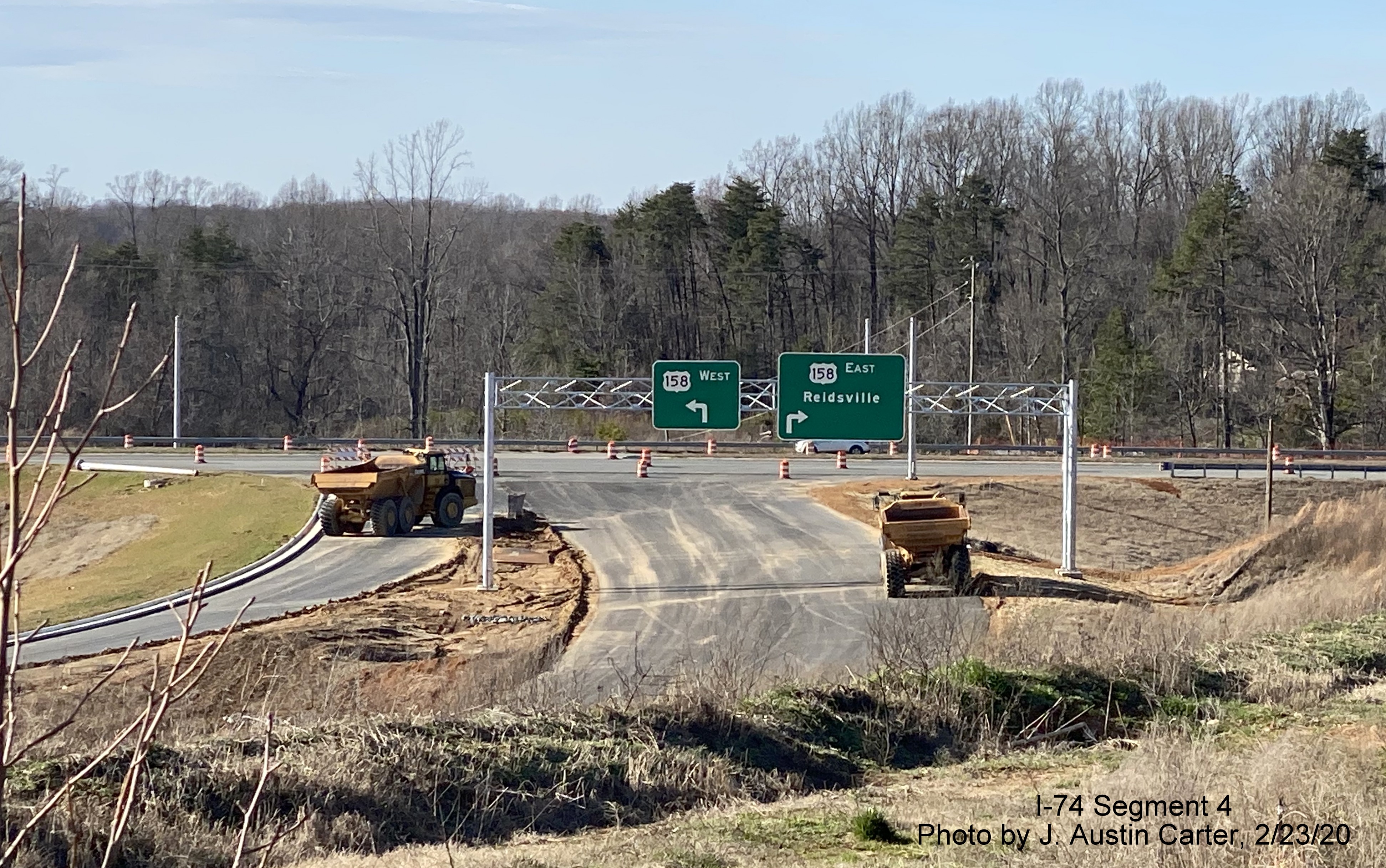 Image of new overhead signage at end of ramp to US 158 from Future I-74 West/
        Winston-Salem Beltway, by J. Austin Carter in Feb. 2020