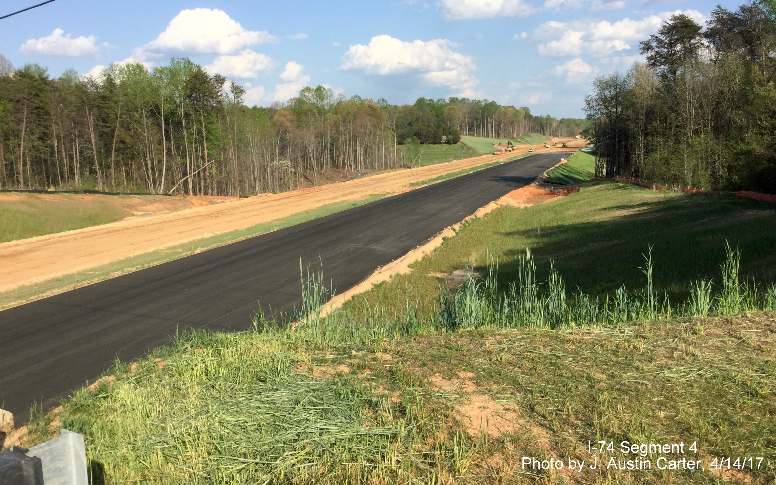 Image of view from completed Walkertown Guthrie Rd bridge over paved lanes for the Future
        I-74 Winston-Salem Beltway, by J. Austin Carter