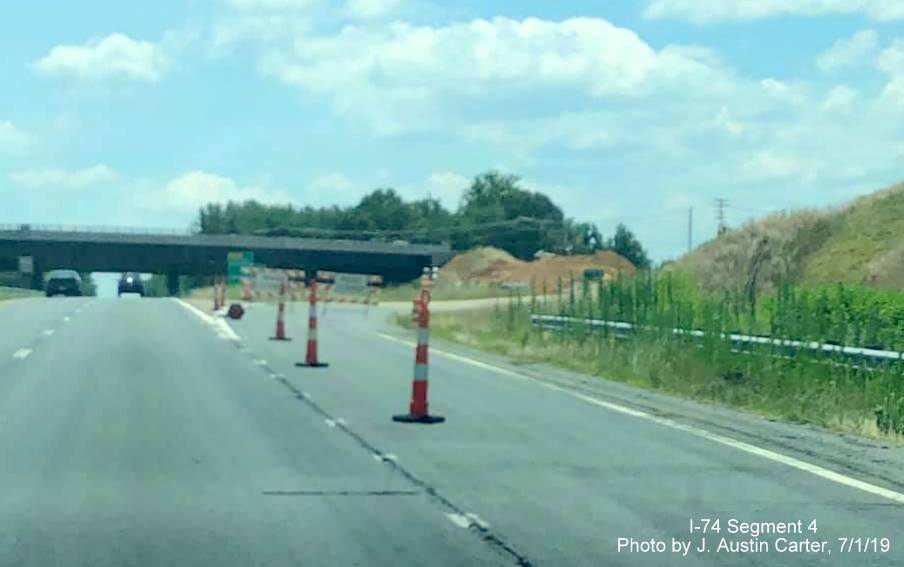 Image of closed former ramp to NC 65 from US 52 South/Future I-74 East in Winston-Salem Northern Beltway interchange project work zone, by J. Austin Carter