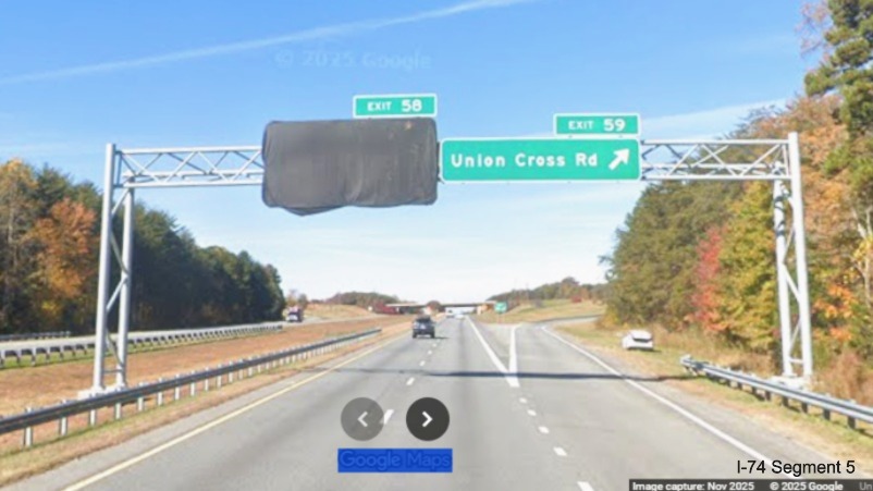 Image of overhead signage at the Union Cross Road exit on I-74 West, with
future NC 192 exit covered over except for Exit 58 tab, Google Maps Street View, November 2025
