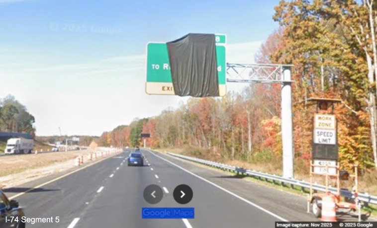 Image of overhead signage for the future NC 192 exit partially covered, Google
Maps Street View, November 2025