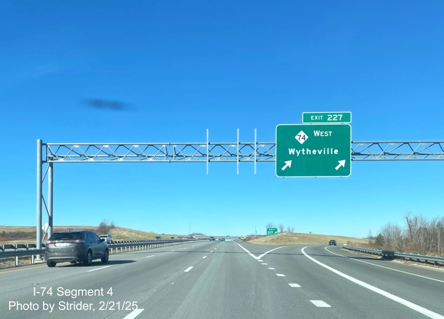 Image of recently placed NC 74 West/Winston-Salem Northern Beltway overhead ramp
	  sign on US 421 North, February 2025, Strider