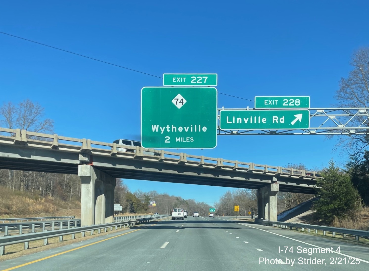 Image of recently placed NC 74 West/Winston-Salem Northern Beltway 2 Miles advance
	  sign on US 421 South, February 2025, Strider