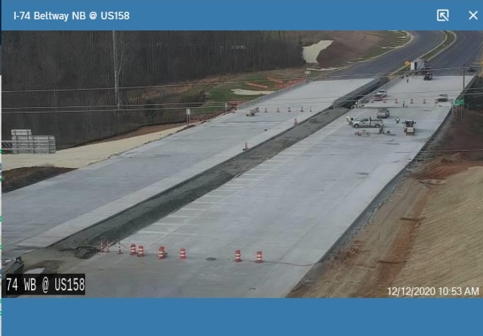 NCDOT traffic camera image of roadway construction near US 158 interchange 
      on Future I-74 Winston-Salem Northern Beltway, December 2020
