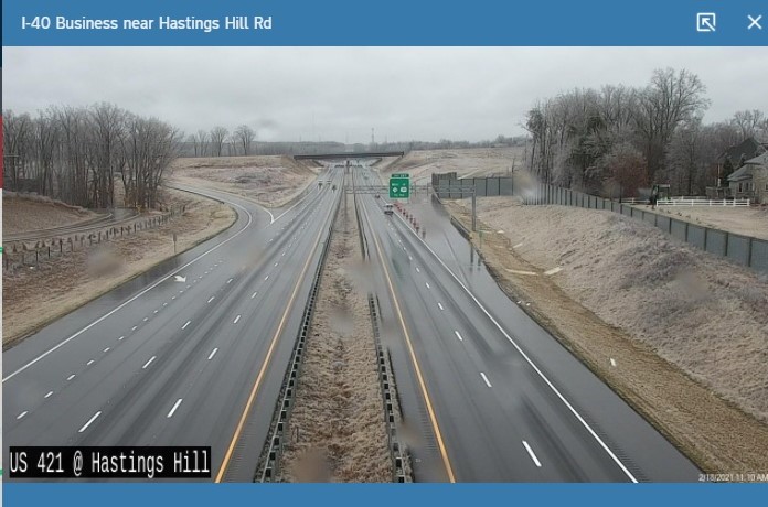 NCDOT traffic camera image of new overhead signs on US 421 for NC 74/Future I-74 Winston Salem Northern Beltway, February 2021