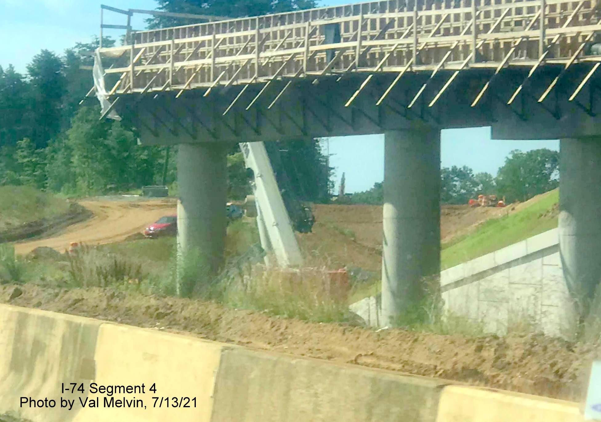 Image of NC 65 bridge completed as part of future Winston Salem Northern Beltway 
        ramp construction over US 52 South (Future I-74 East) in Rural Hall, by Val Melvin. July 2021